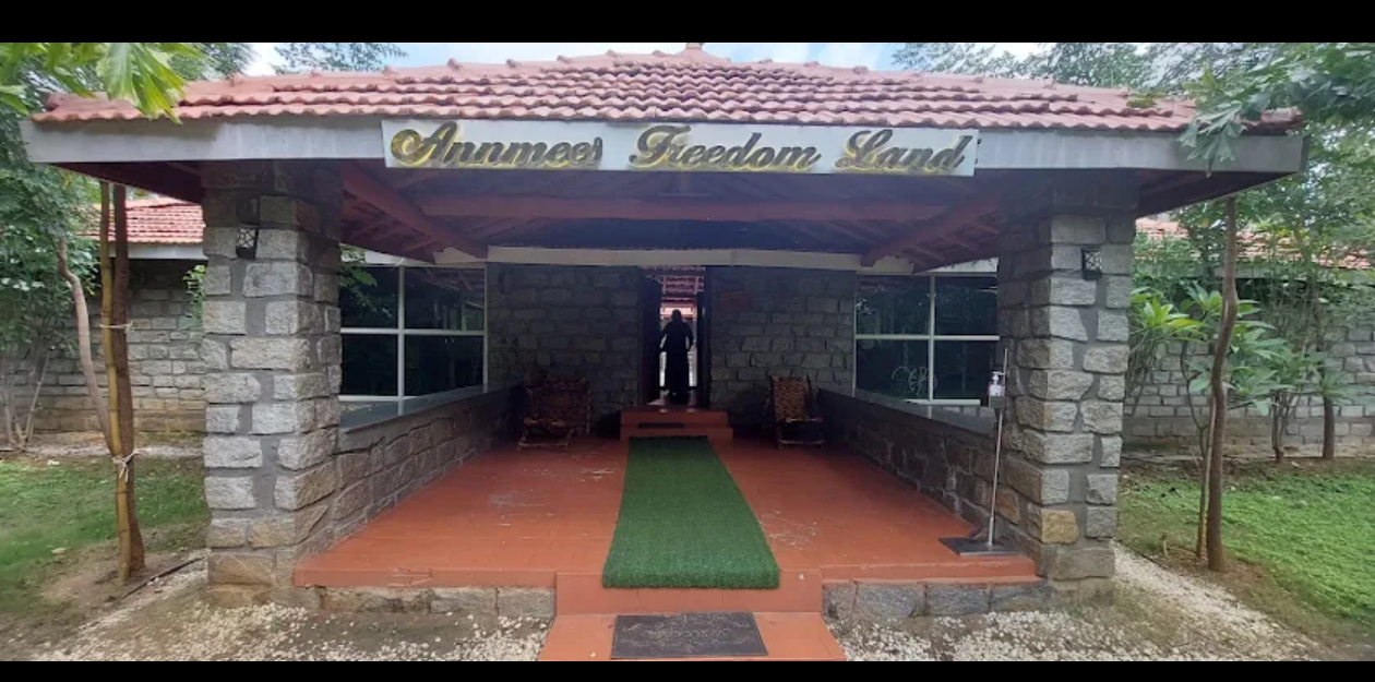 The stone farmhouse entrance at Annmees Freedom Land